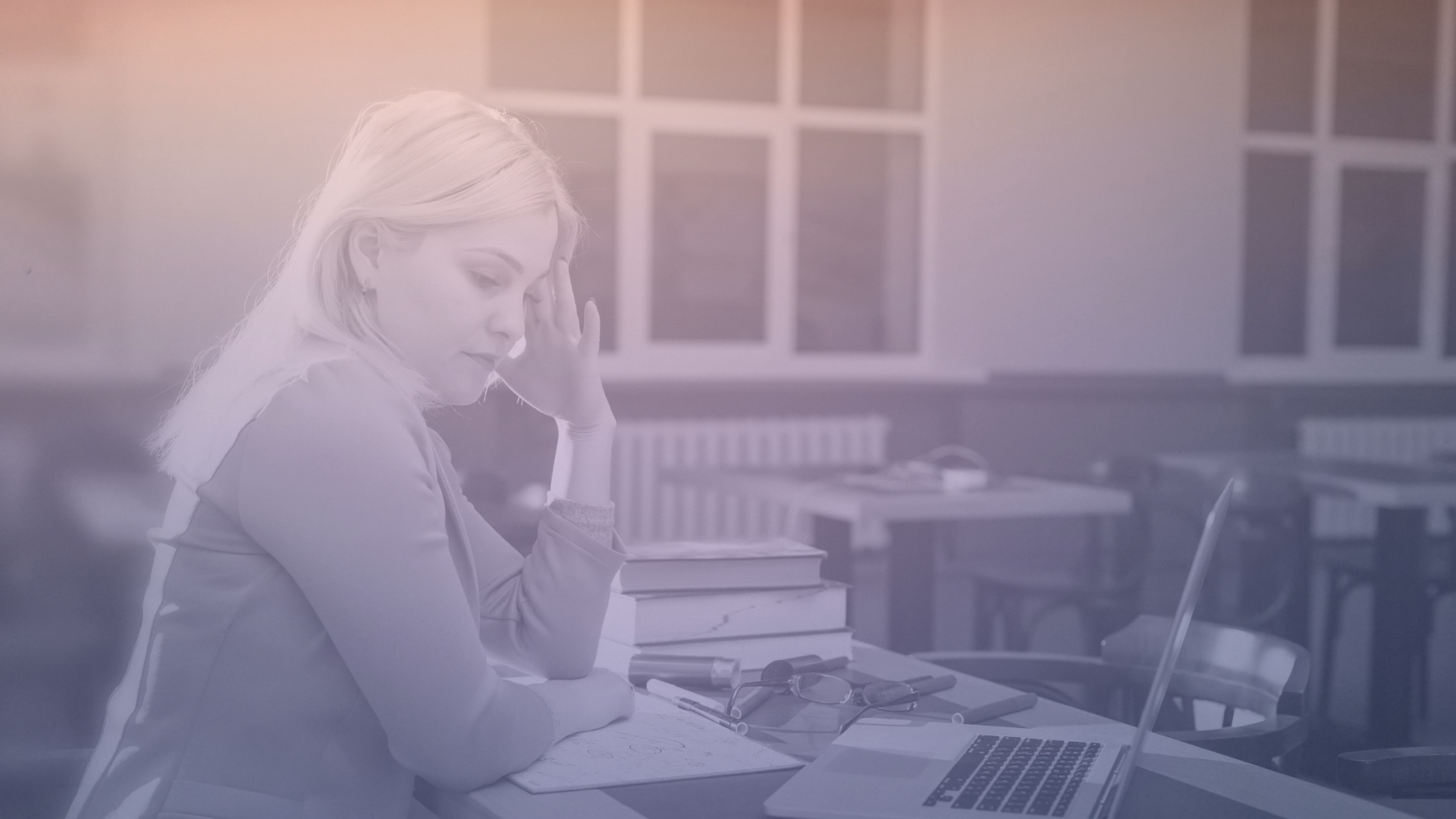 Frustrated teacher using a computer